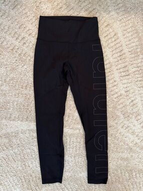 Lululemon Wunder Train High Rise Black w/ iridescent spellout/hit -size 6 NWOT